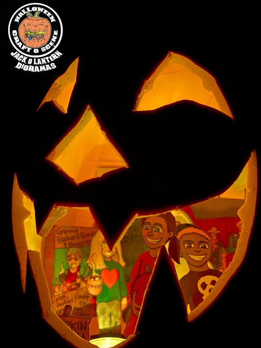 A Halloween-themed jack-o'-lantern with a colorful printed scene inside, photographed against a black background. A circular 'Halloween Craft O Scene' logo is visible in the top-left corner.